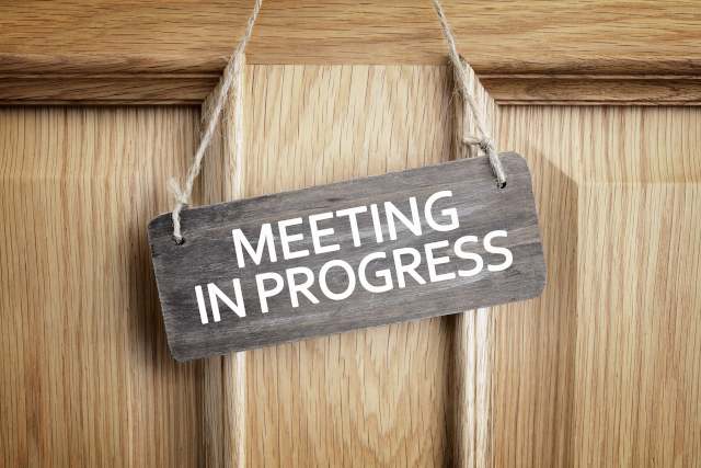 meeting-in-progress-sign-on-office-door-640-427